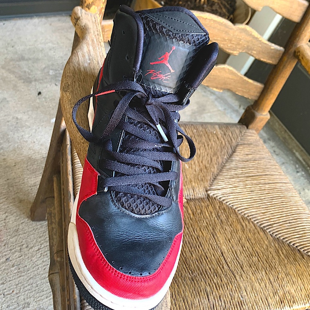 Size 12 red and black Jordan 12s